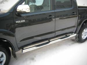 Пороги труба с накладками d76 на Toyota Hilux (2006-2014)